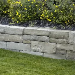 Retaining Wall Built Using Chopped Stones Delivered From KK Ranch Stone & Gravel
